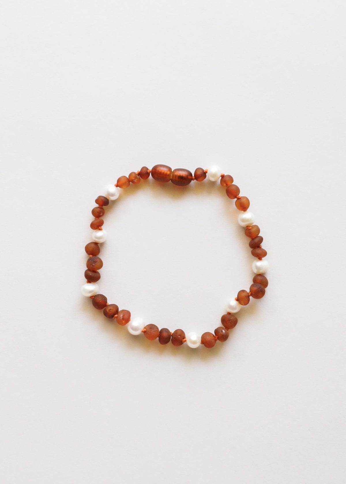Cognac amber bead bracelet/anklet with small white pearls along the strand