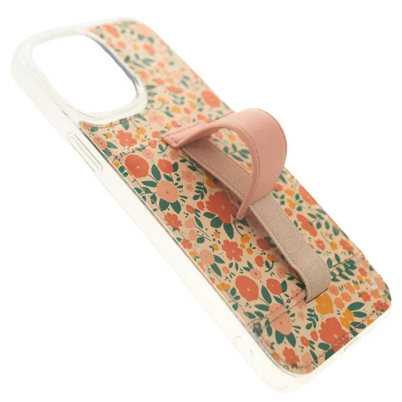 Floral phone case with clear bumper and pink strap on a phone