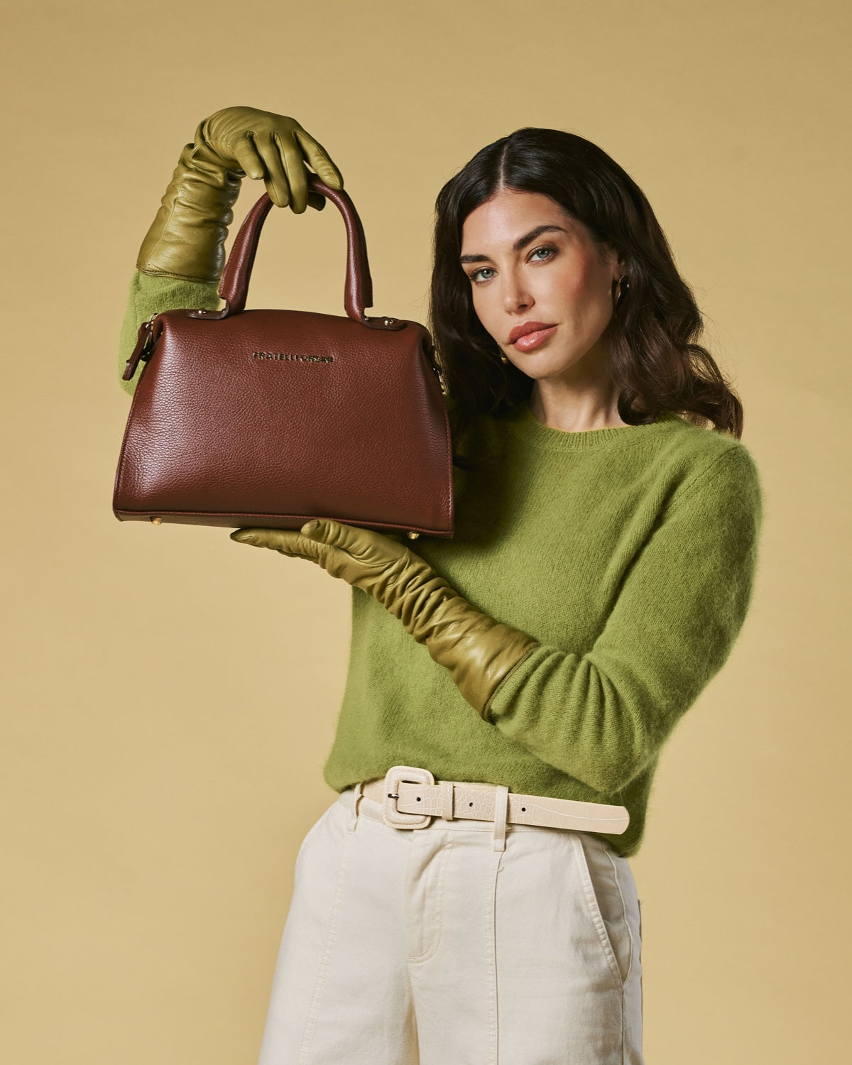 Brown calf leather handbag with top handles and zipped top; shoulder strap attached