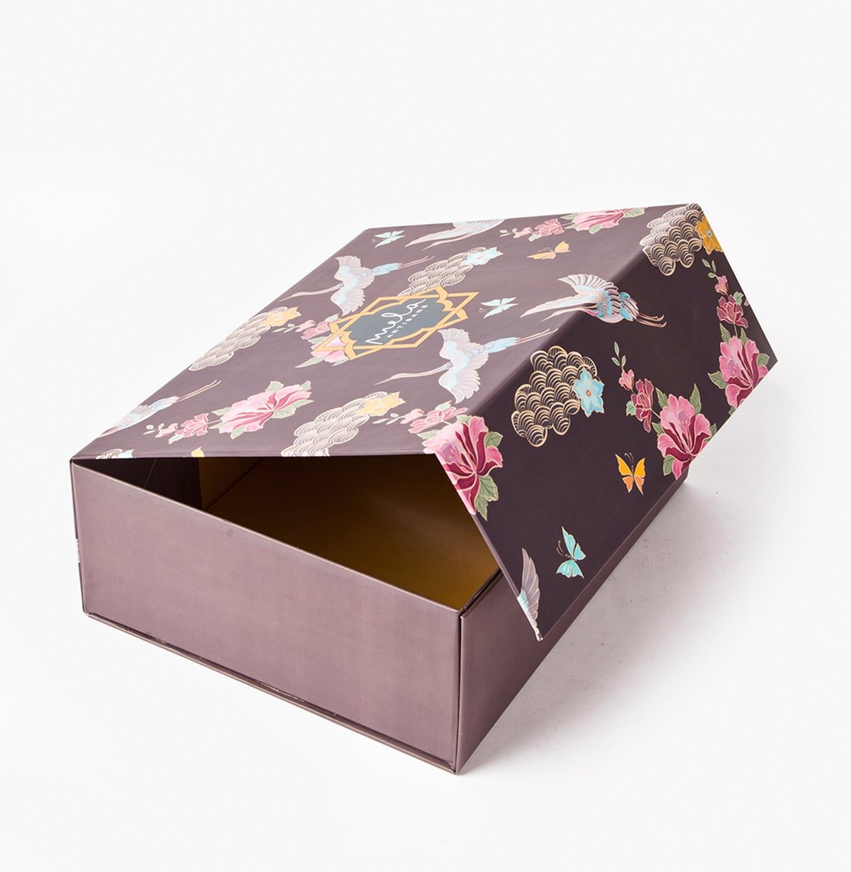 Open decorative gift box with dark brown floral-crane print and inner brown lining