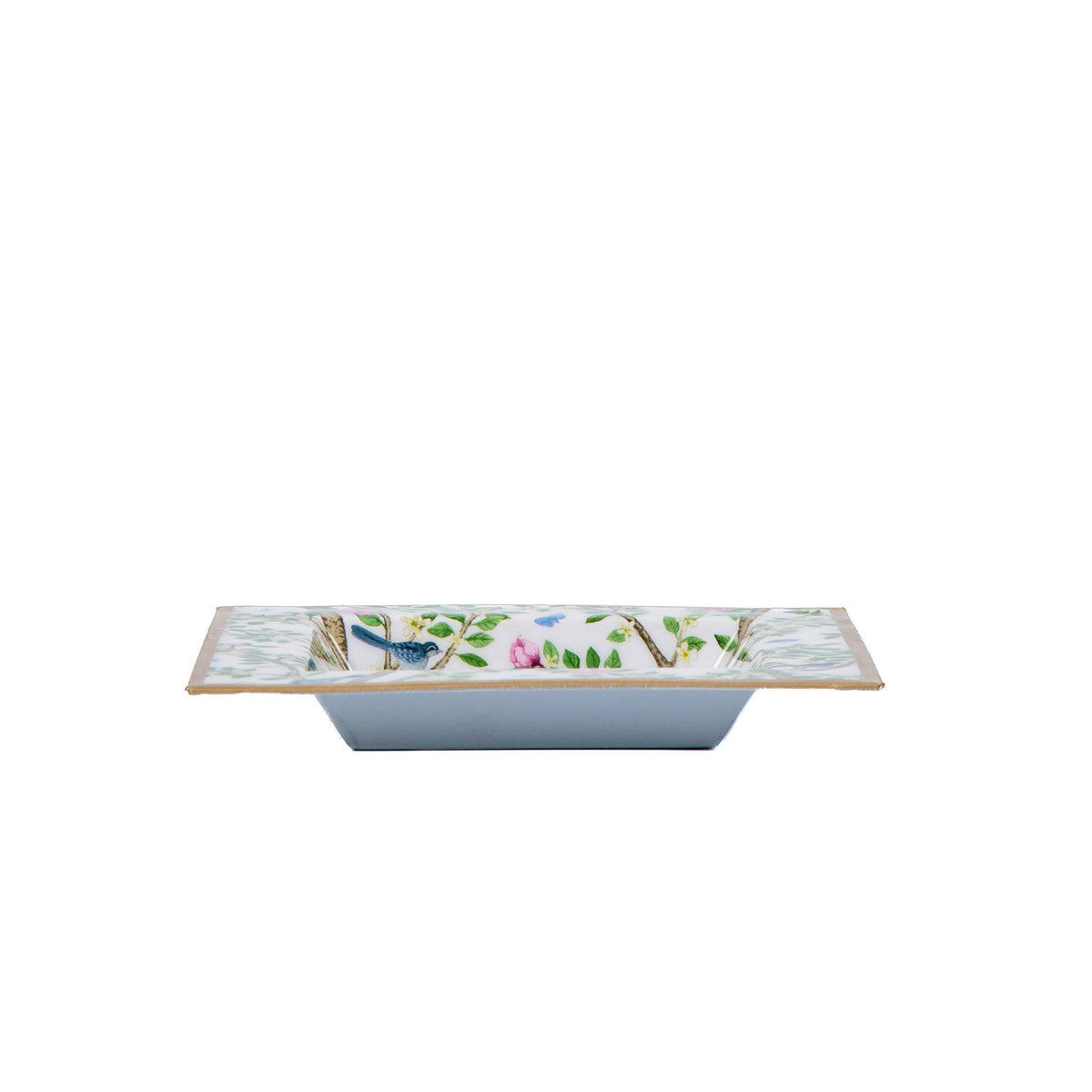 Enameled trinket tray side view with blue base and white rim, floral bird artwork edge