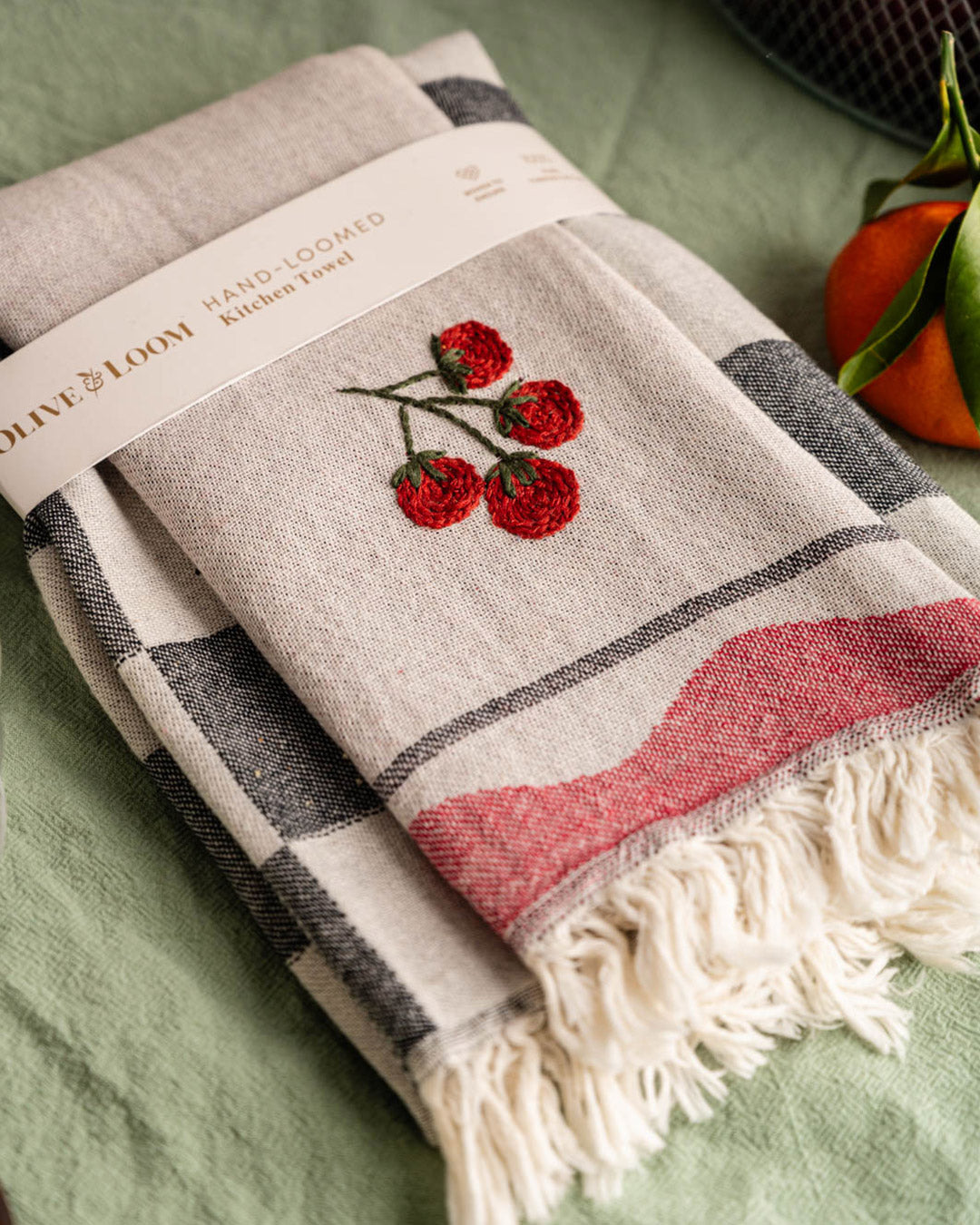 Kitchen towel set with red tomato embroidery, gray check trim, red stripe hem, fringes