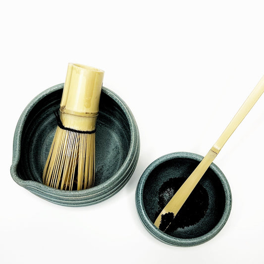 Forest green matcha bowl set with whisk and mini bowl, ceramic stone-texture finish.