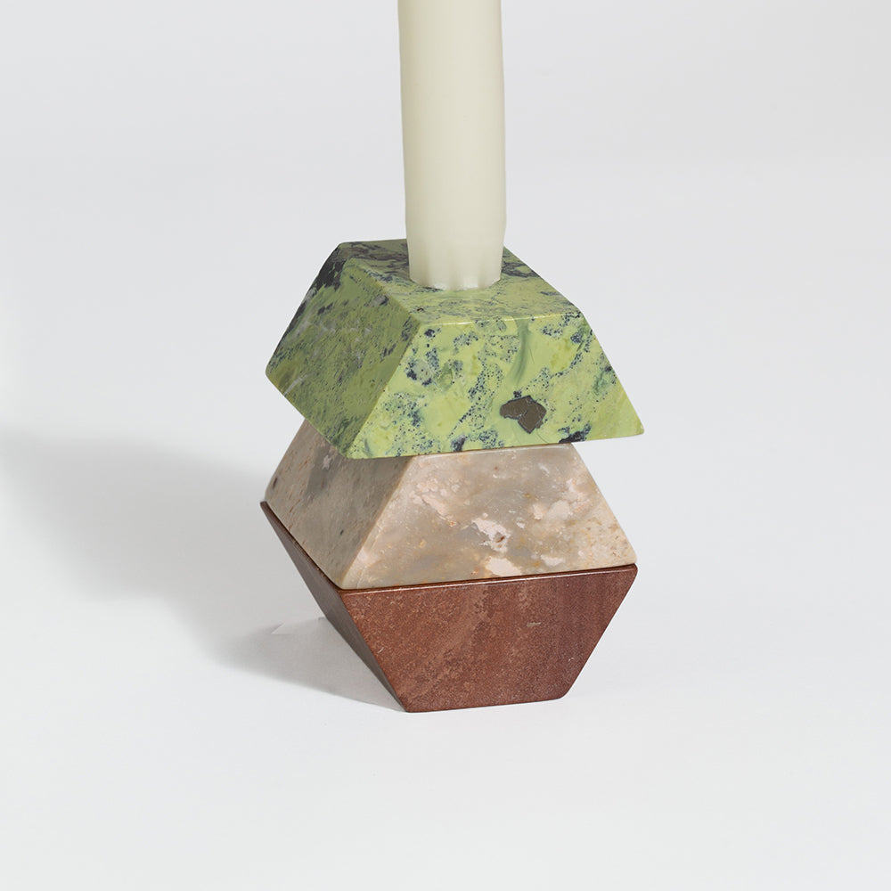 Stackable triangular candelabra with green middle piece and tall candle