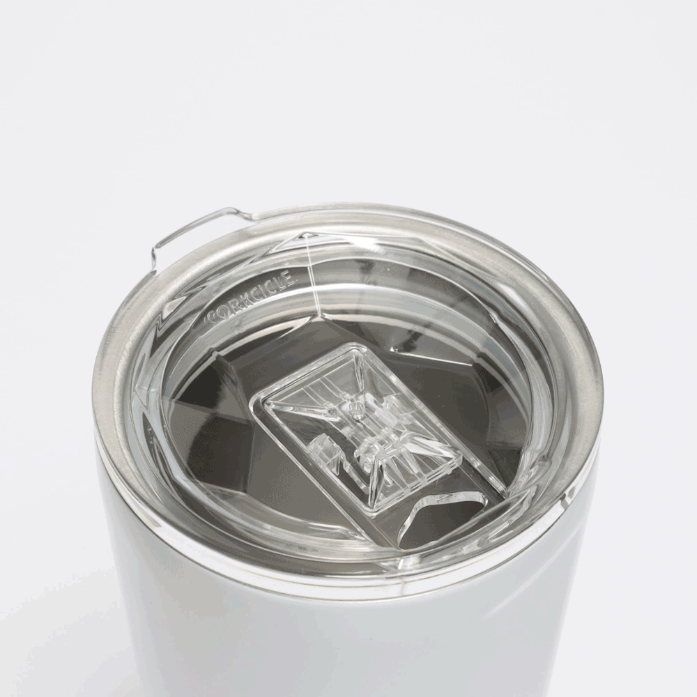 Clear lid top for a cream stemless tumbler with removable sipping insert