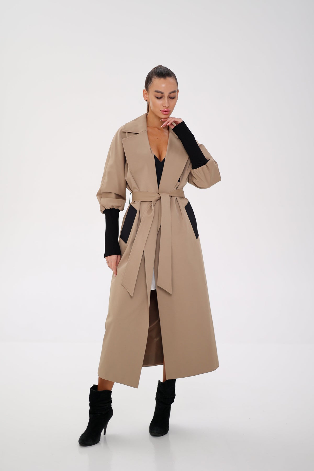 Miru camel trench coat with gathered sleeves, wide lapels, and a matching tie belt