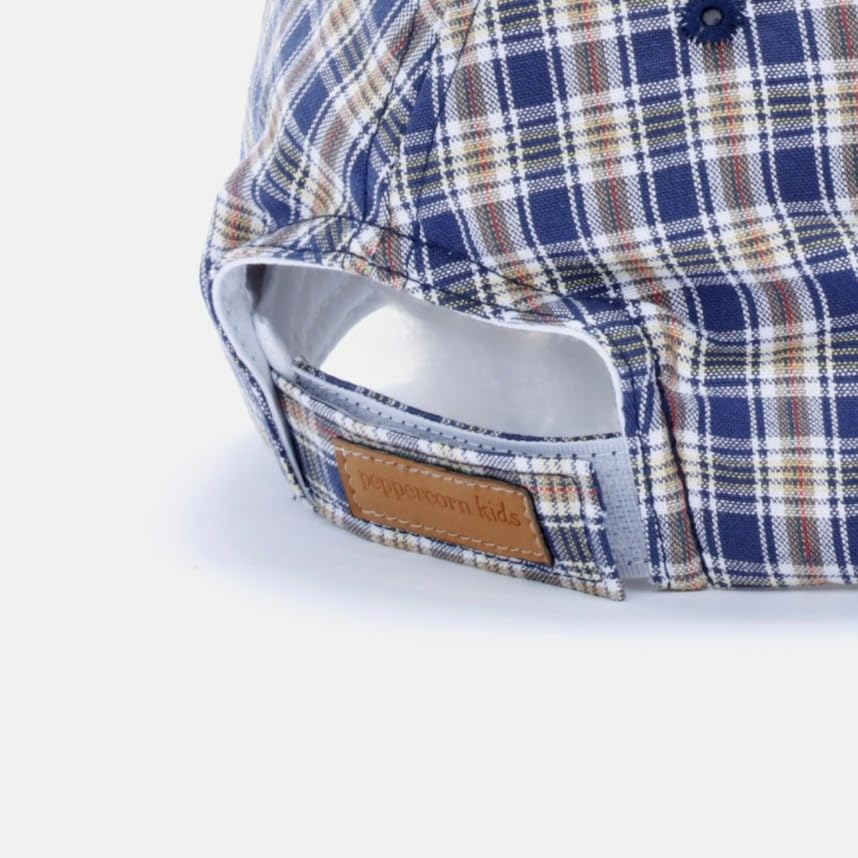Blue plaid cap back with adjustable opening and a small leather-look label