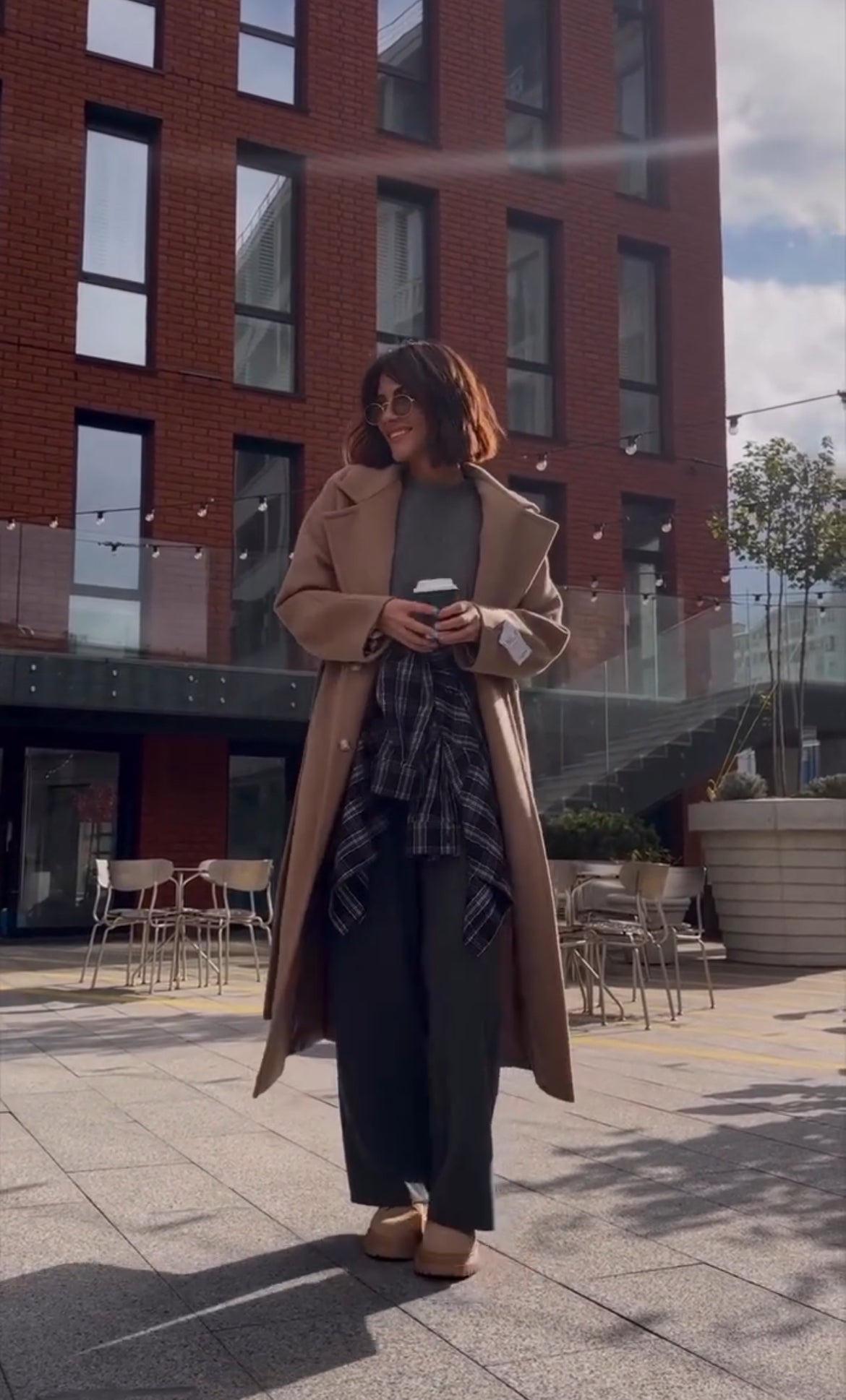 Long camel cashmere wool-blend coat with wide lapels, shown open