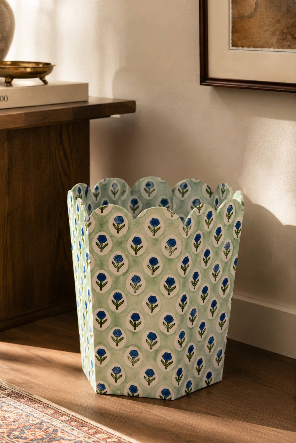 Collapsible storage basket in mint with repeating blue-and-green leaf block print