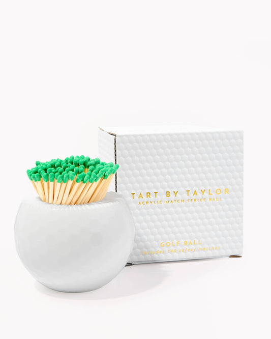 White match holder with green-tipped wooden match heads, with retail box