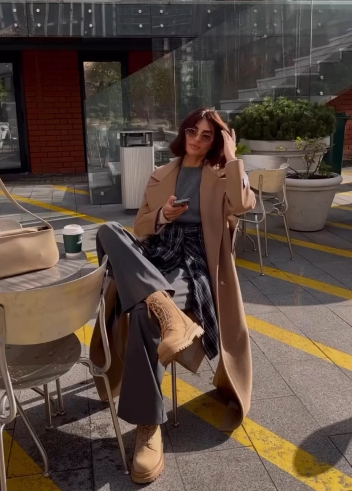 Camel cashmere wool-blend coat with wide lapels and a long silhouette