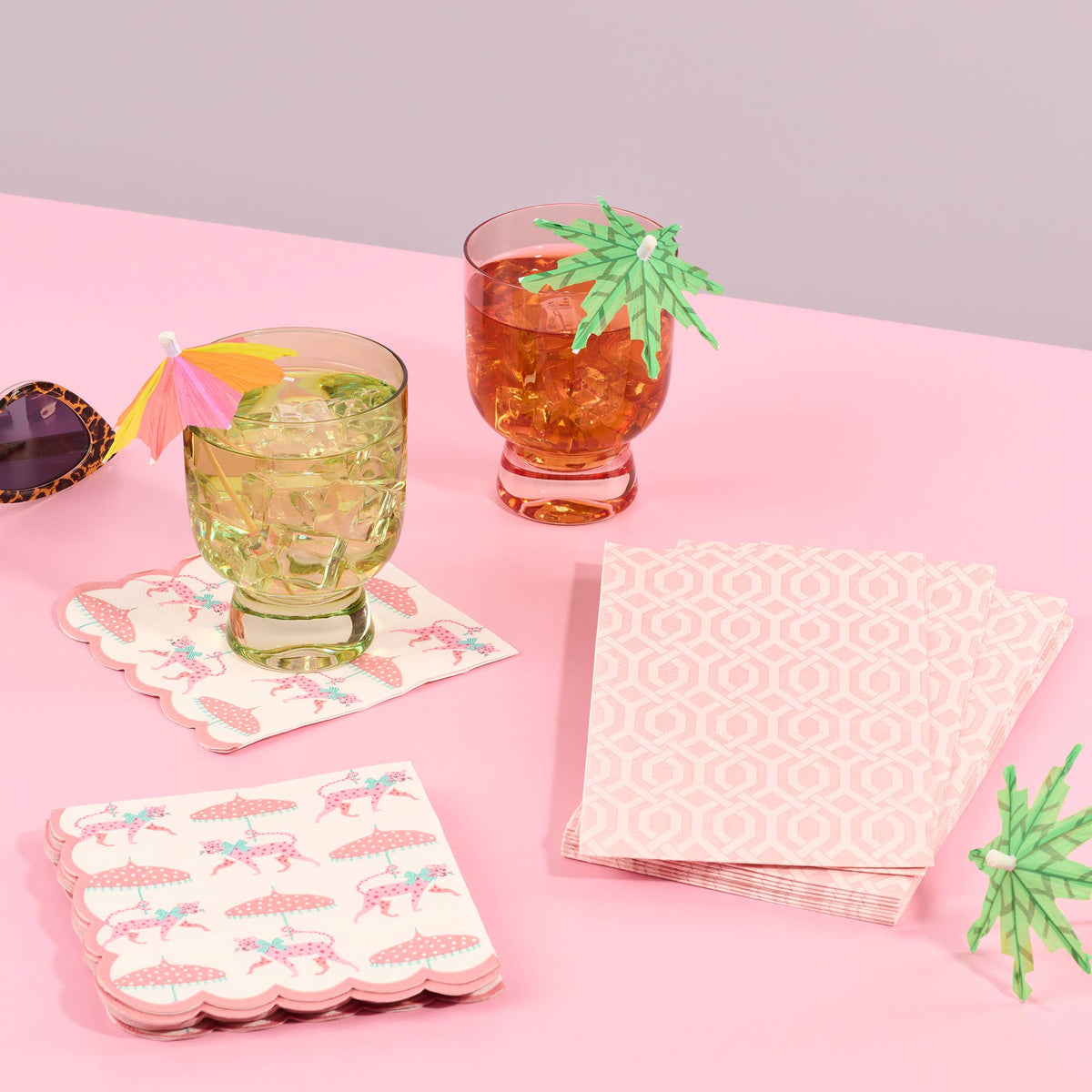 Pack of pink scalloped beverage napkins with leopard and tutu dress pattern