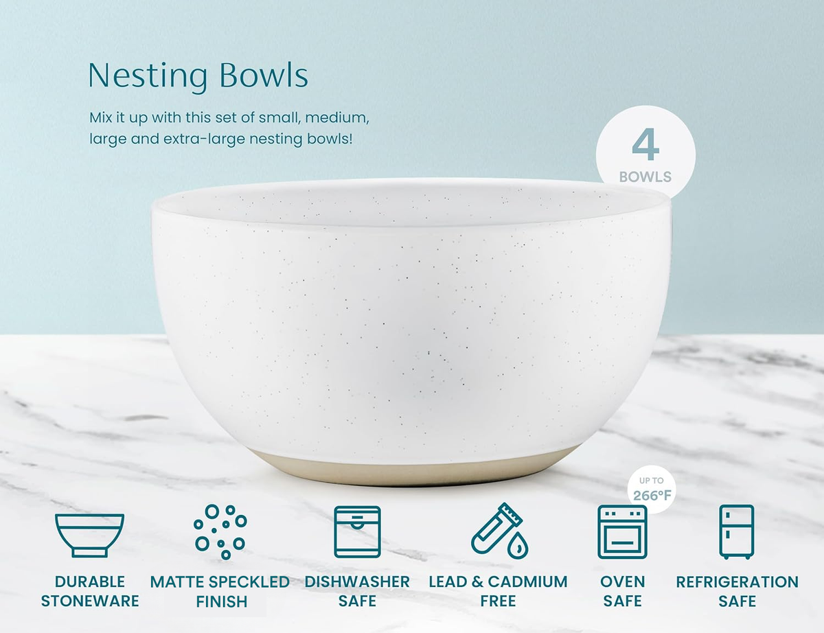 Large speckled off-white ceramic nesting bowl, round with a flared rim