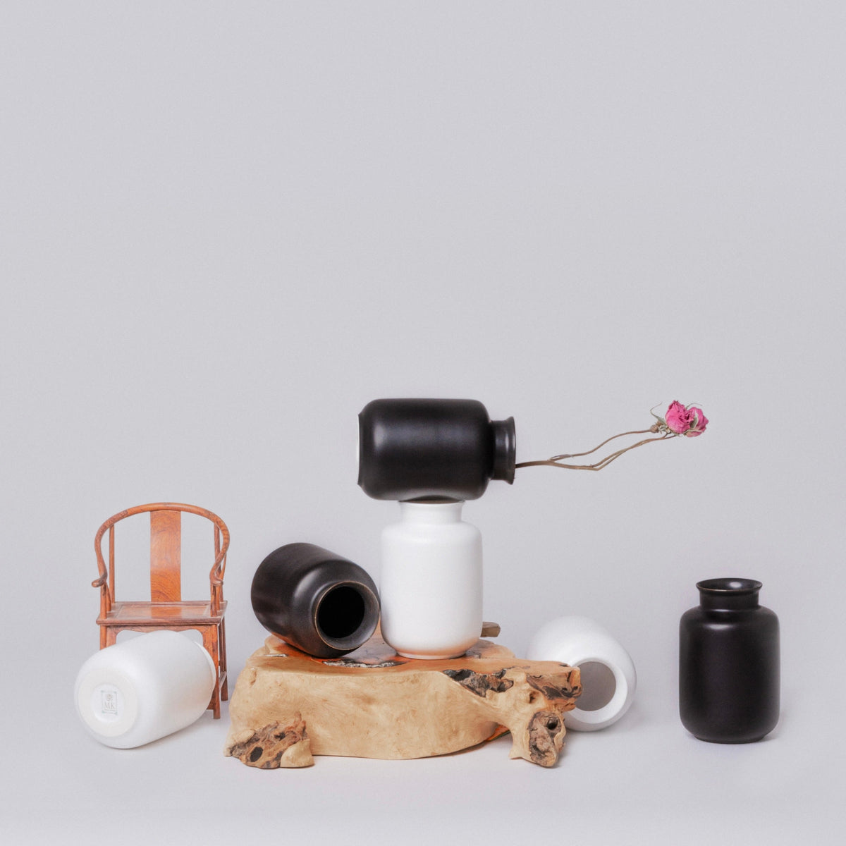 Small black and white vase set with open-mouth cylinder shapes