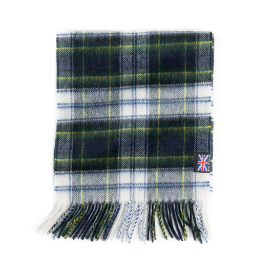 Tartan scarf folded flat, green and white plaid with fringed hem and small flag tag