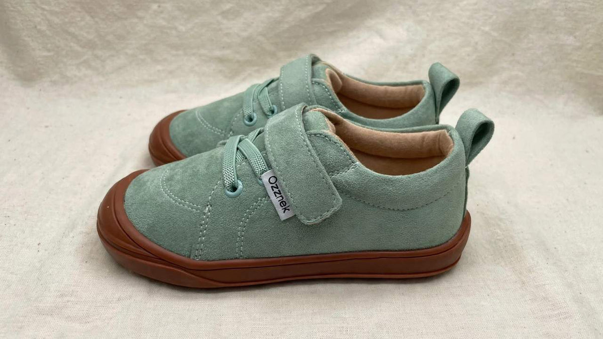 Kids’ light green barefoot sneakers with brown outsole and ankle strap detail