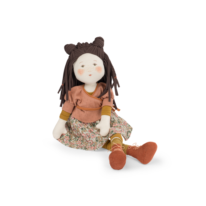 Sitting cloth rag doll with dark brown yarn hair, terracotta top, floral dress, brown boots