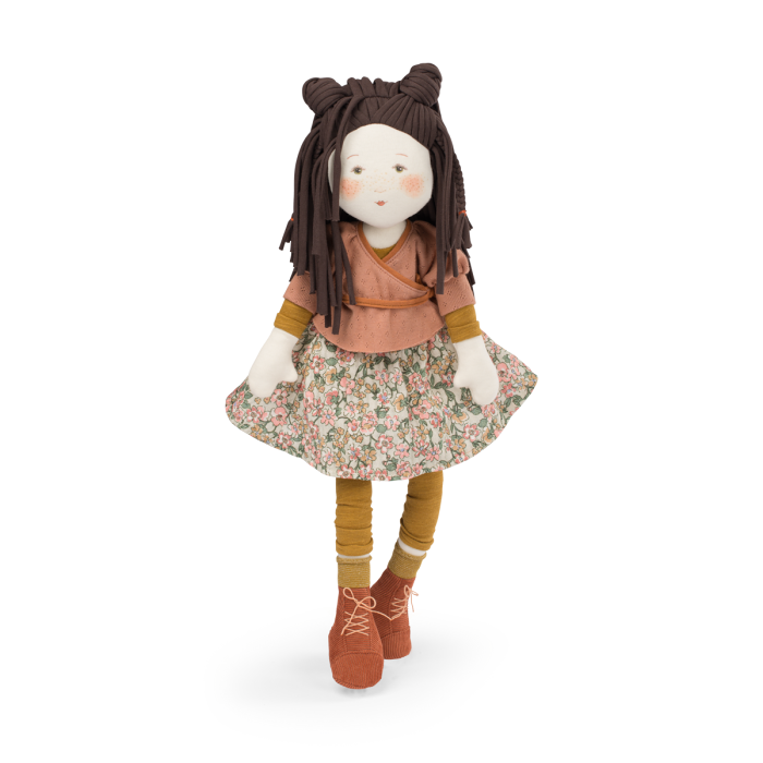 Cloth rag doll with dark brown yarn hair, terracotta top, floral skirt, brown boots