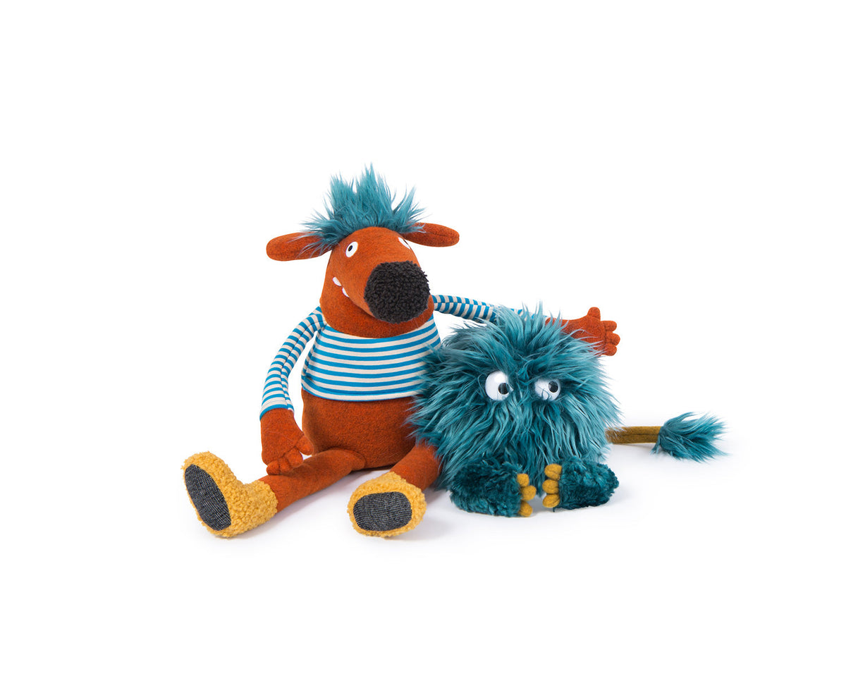 Choukette blue shaggy plush monster with yellow toes and a long tail, beside an orange plush toy