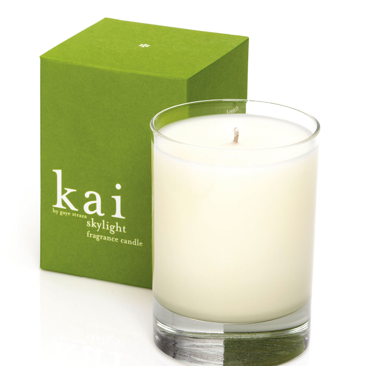 Green kai skylight candle in clear glass, white wax, centered wick