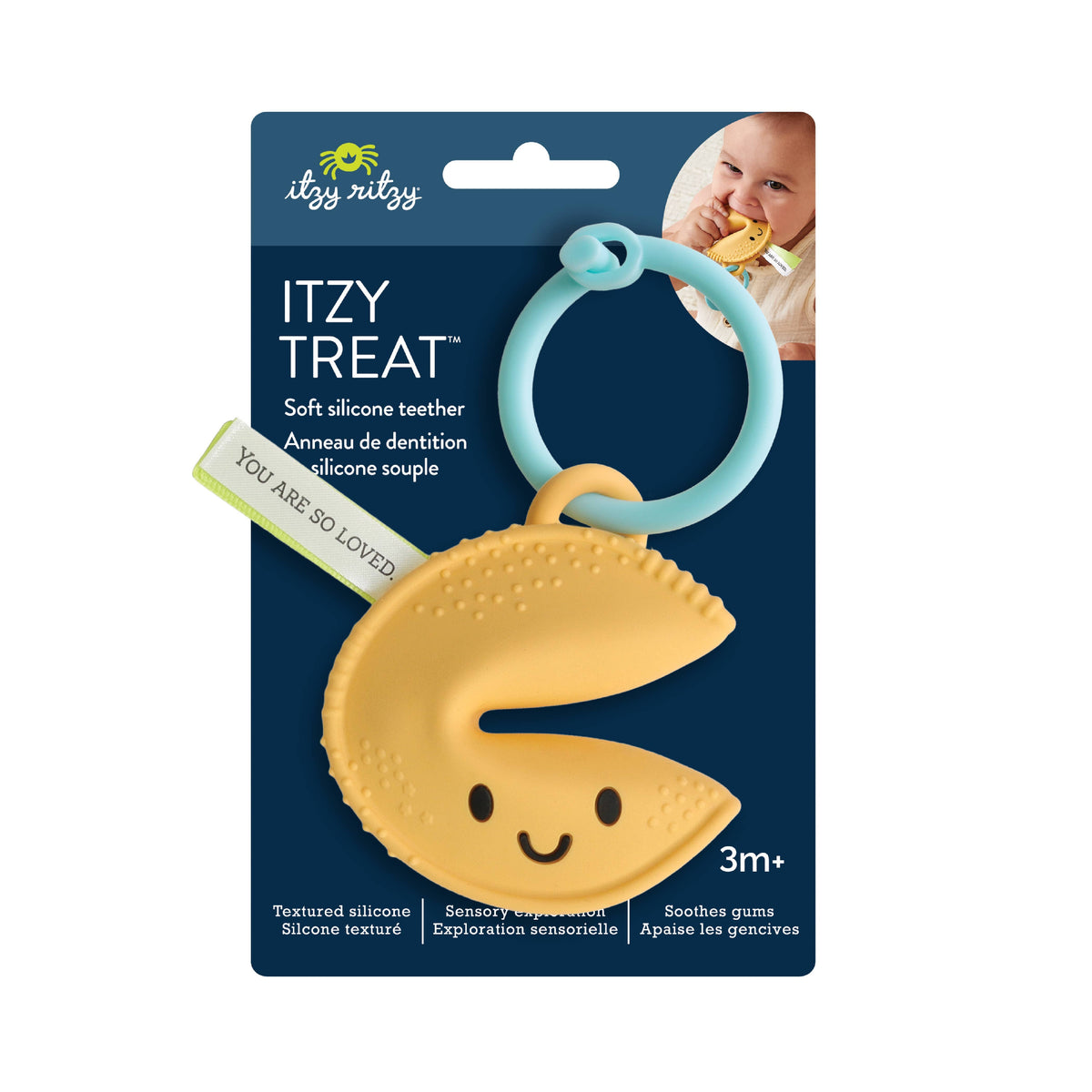 Itzy Treat silicone fortune-cookie teether package with blue ring and ribbon
