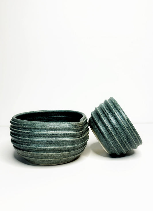 Forest green ceramic matcha bowls set, stack of bowls with matching lids/mini cups.