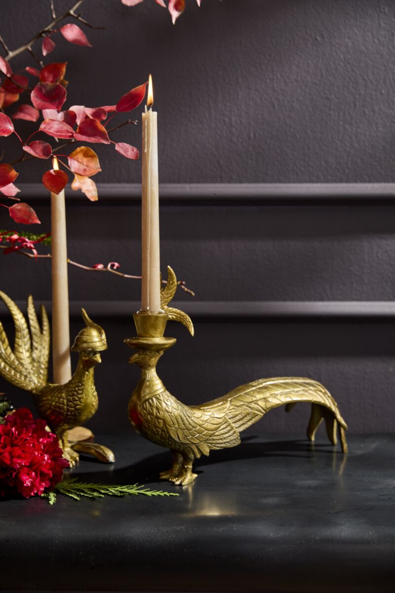 Brass pheasant candlestick with raised candle holder on bird head