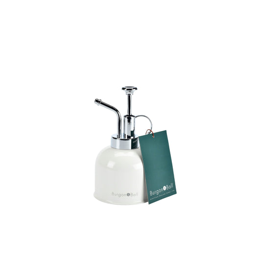 Indoor plant mister with stone-colored bottle and chrome spray top