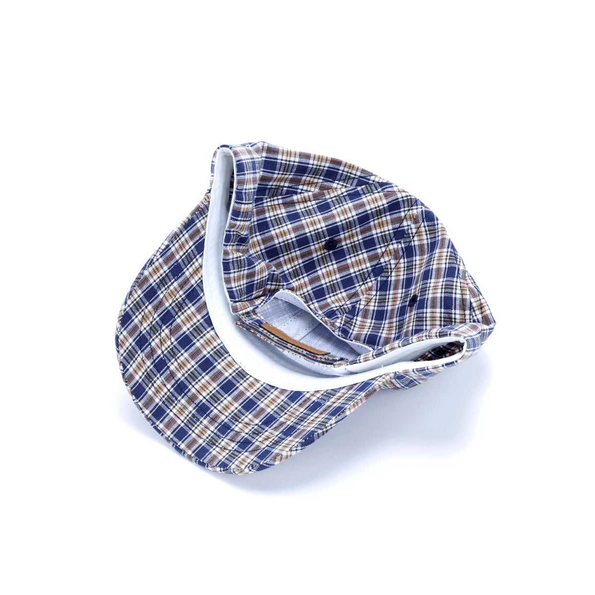 Children's blue plaid baseball cap showing the lined interior and curved brim
