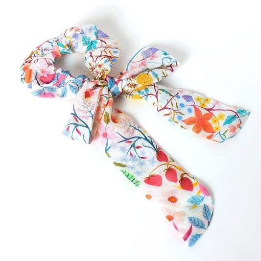 Floral hair scarf in light ivory with colorful botanical print, tied bow