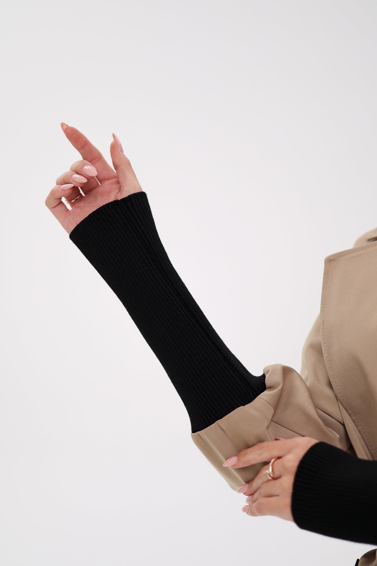 Miru trench coat sleeve detail with a black ribbed cuff