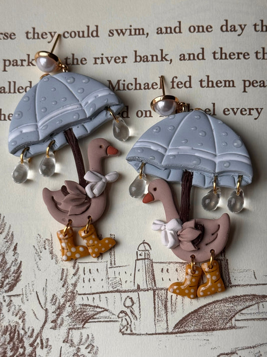 Duck ornament set with small umbrellas and bead drops, brown and tan accents