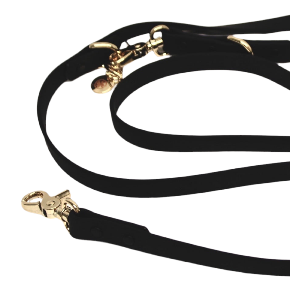 Black hands-free dog leash with gold clasp and O-ring hardware