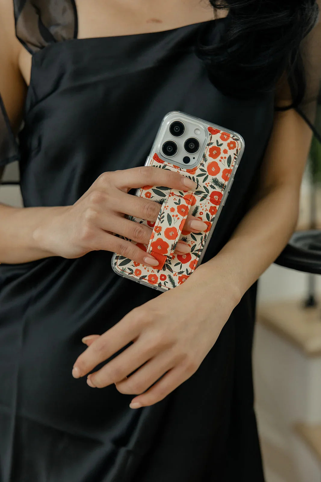 Red-and-white floral phone case with clear edge protection
