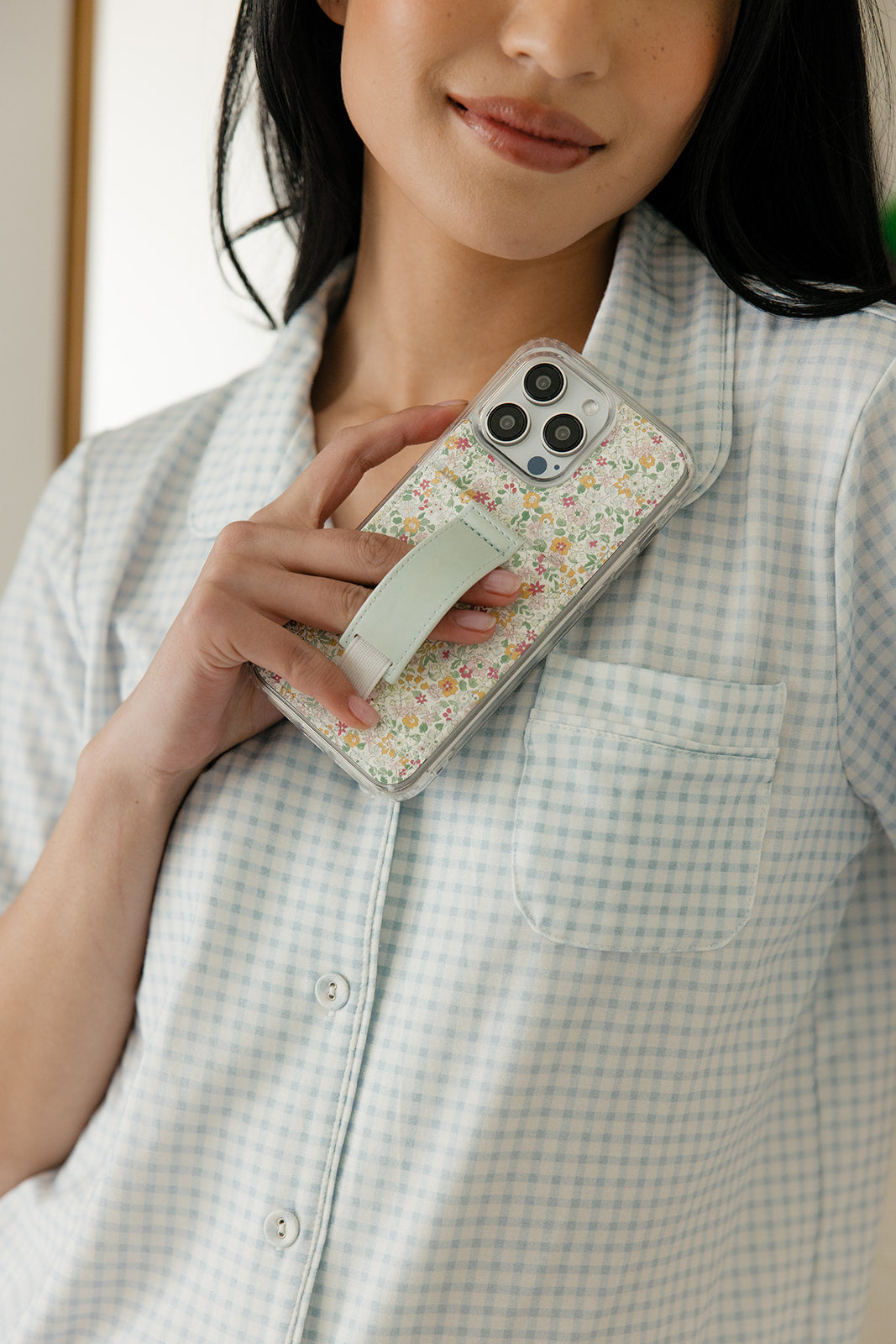 Petal Garden floral phone case with light blue strap detail
