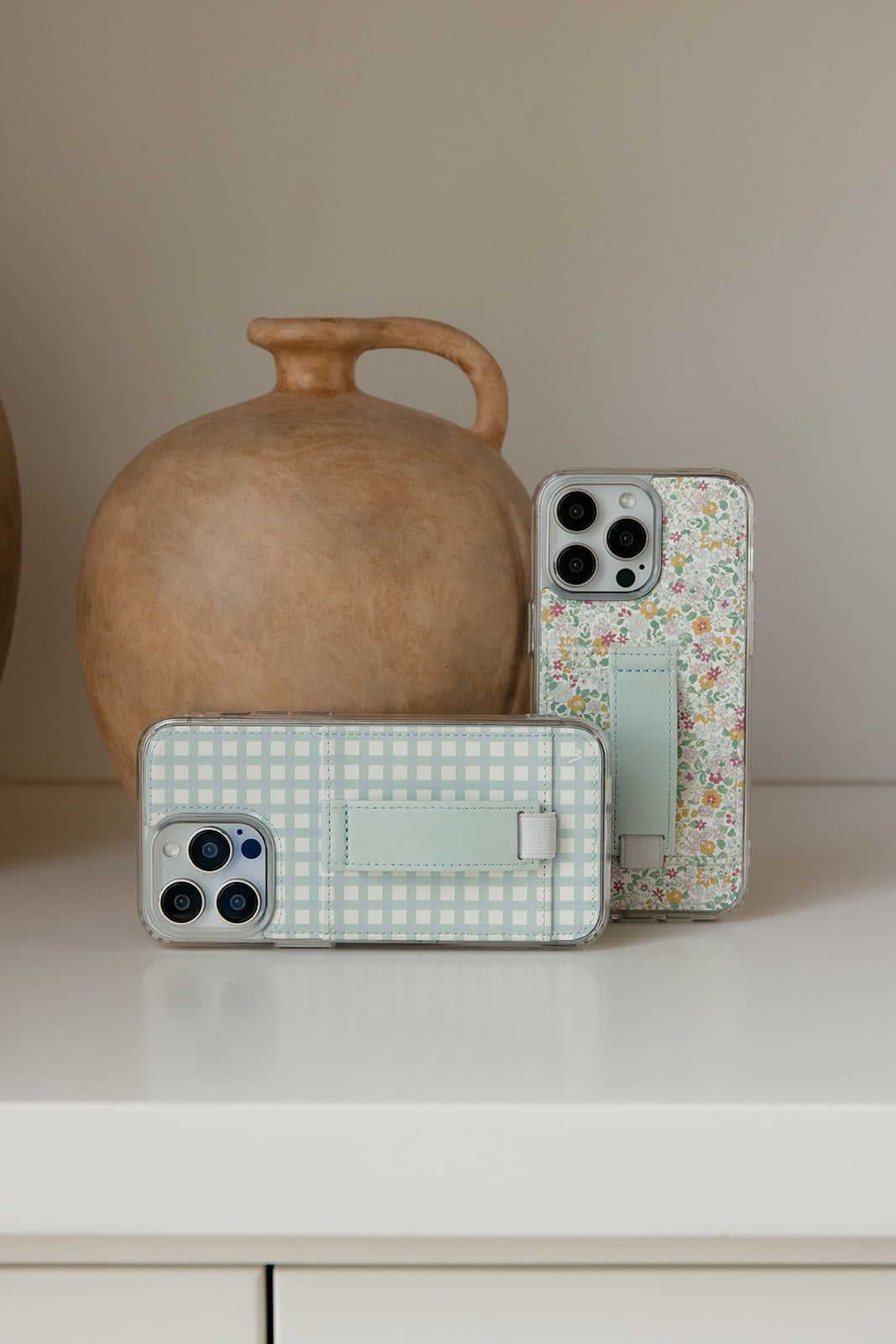 Petal Garden clear floral phone case with light blue wrist strap and card holder