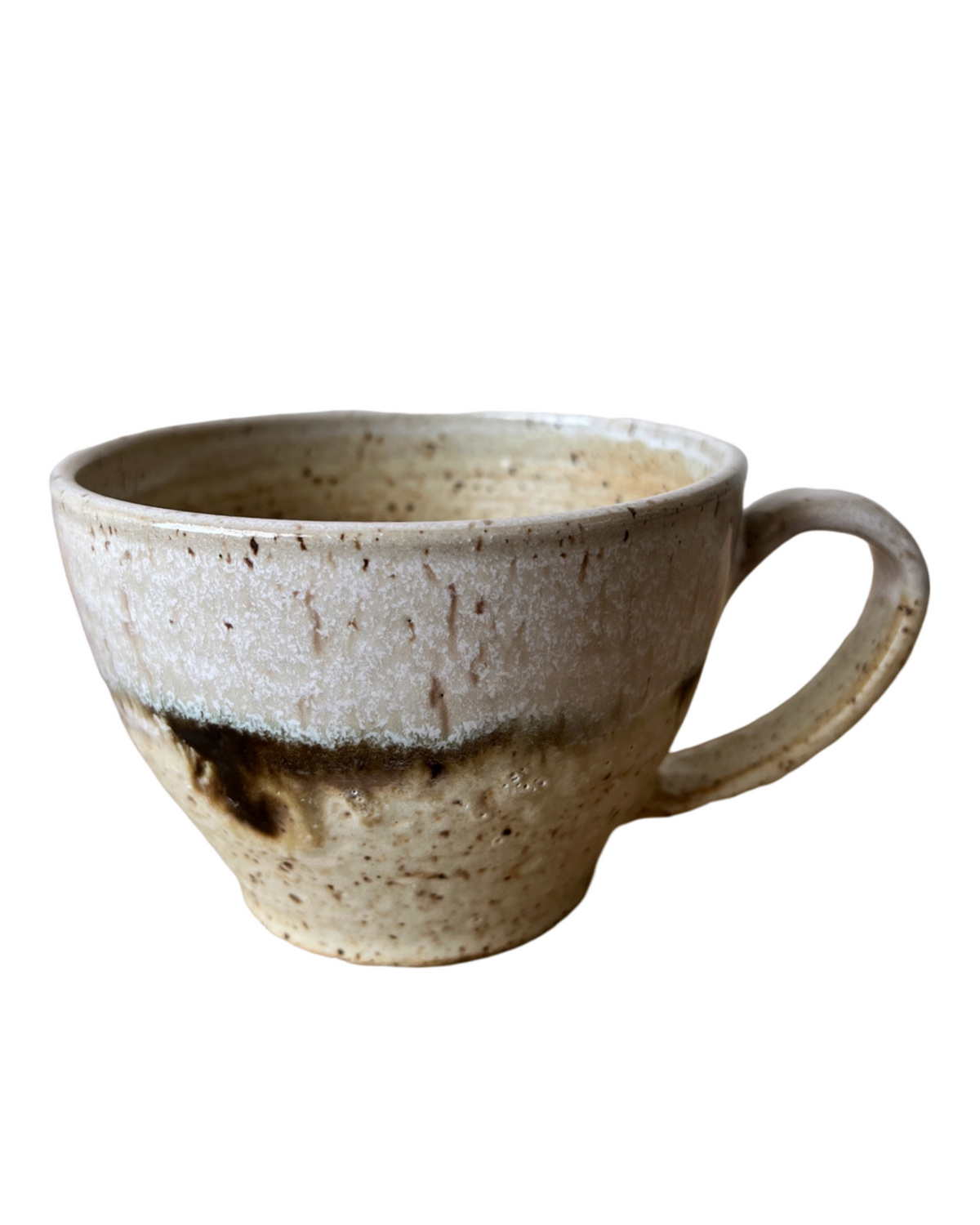 Speckled ceramic cappuccino cup with dark brown drip glaze and curved handle