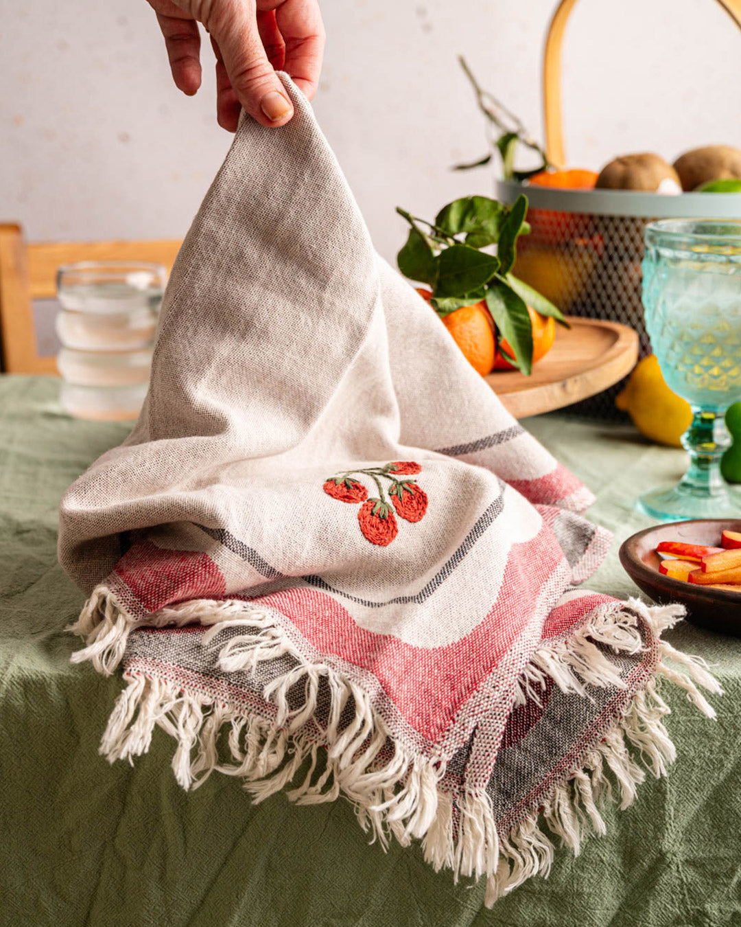 Hand towel with gray check border, red tomato embroidery, beige with red wave stripe, fringes