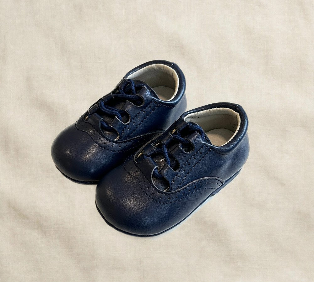Kids lace-up dress shoes with wide toe box, dark navy leather, side view