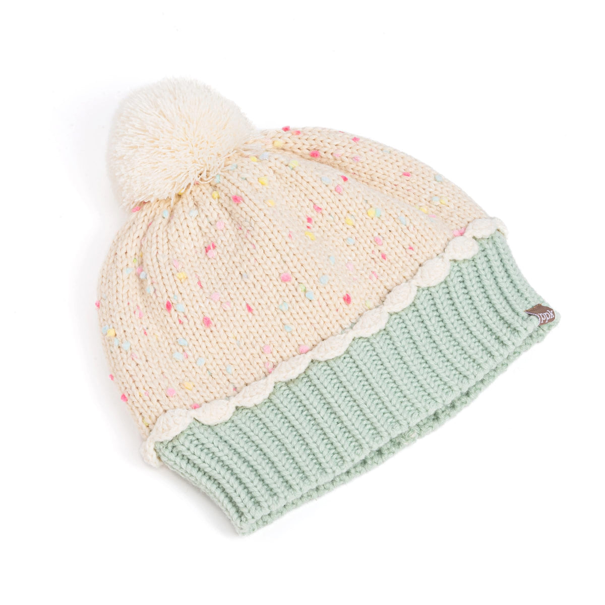 Cream speckled knit beanie with mint green ribbed brim, scalloped trim and pom-pom.