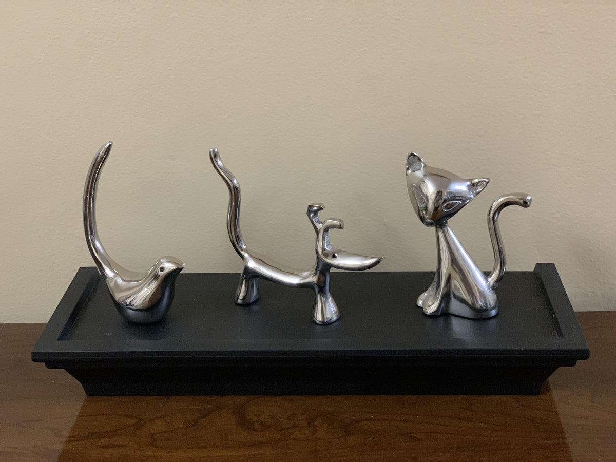 Silver animal ring holder set with four standing cat and dog shapes, metallic finish