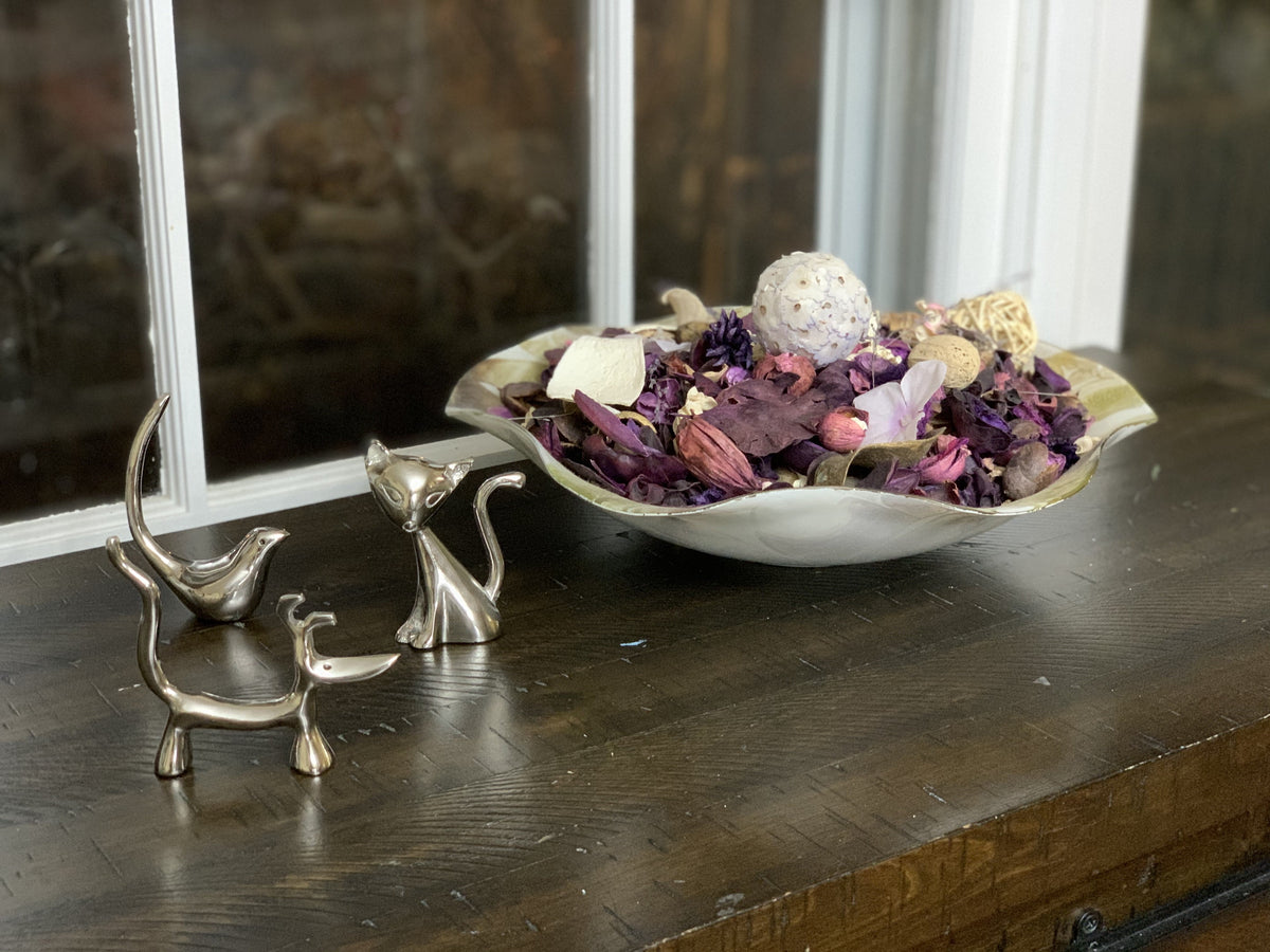 Silver cat and dog ring holder set with sculpted animal figures and metallic finish