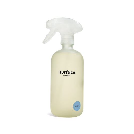 Surface cleaner spray bottle with clear trigger and pale yellow liquid