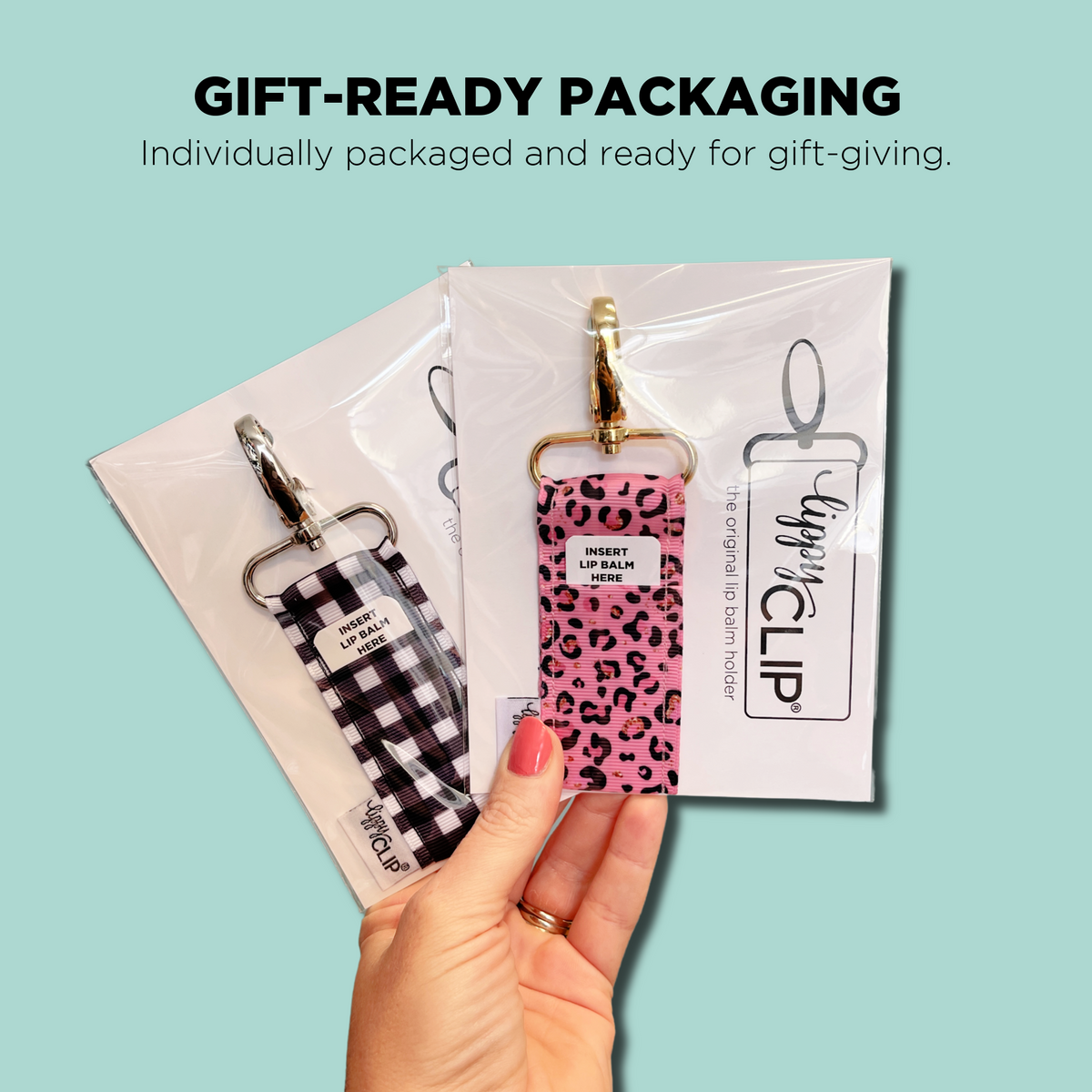 Gift-ready packaging with clear bags containing lip balm holders and gold key clips