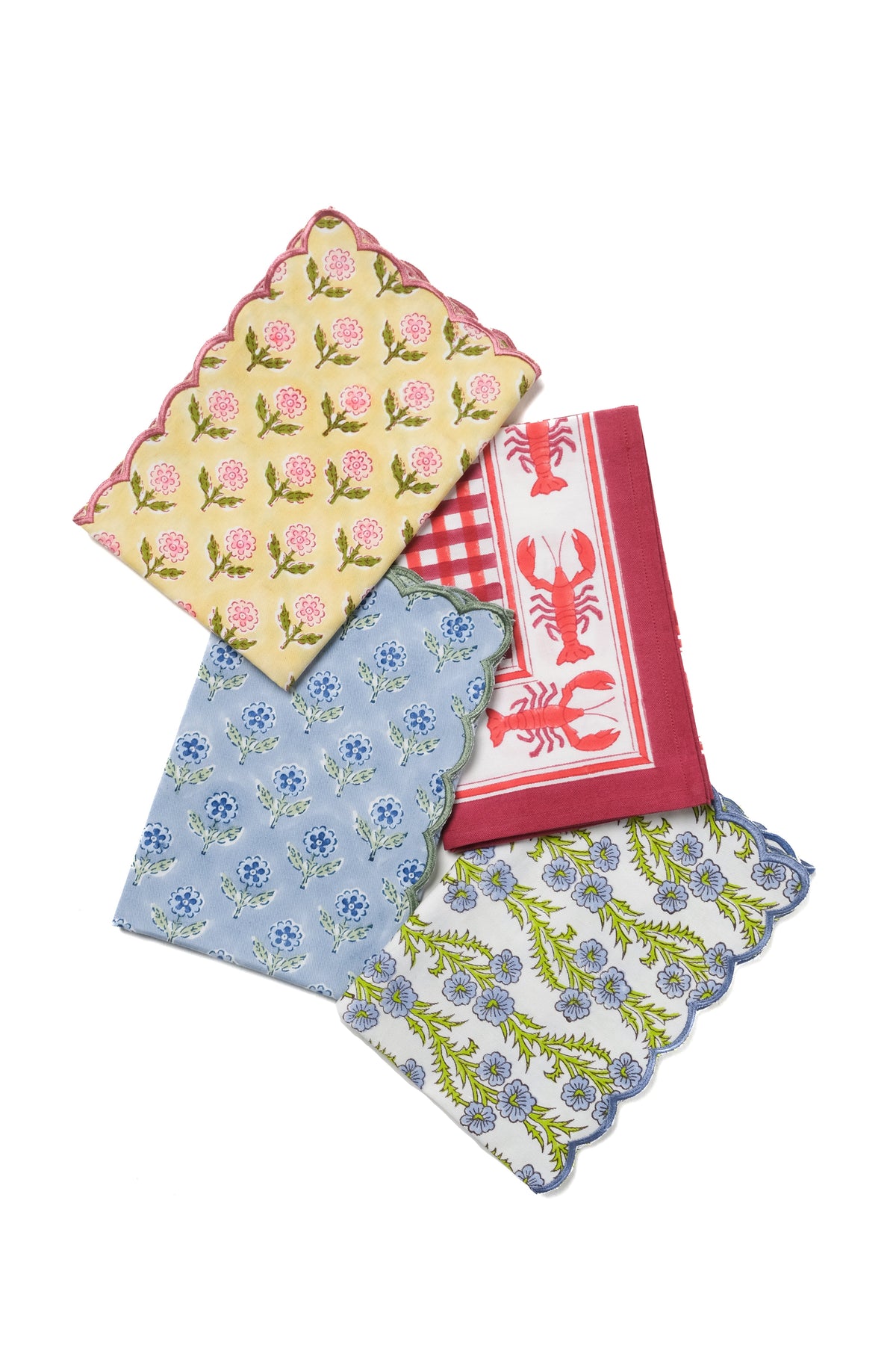 Set of 4 scallop-edged embroidered napkins with pink, blue, and green floral prints
