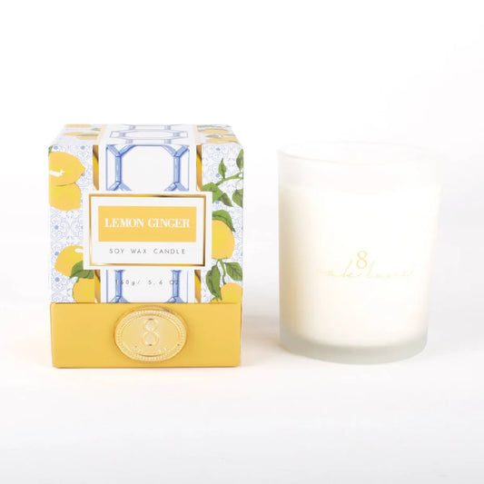 Boxed 5.6 oz soy wax candle with lemon ginger label and frosted white glass jar