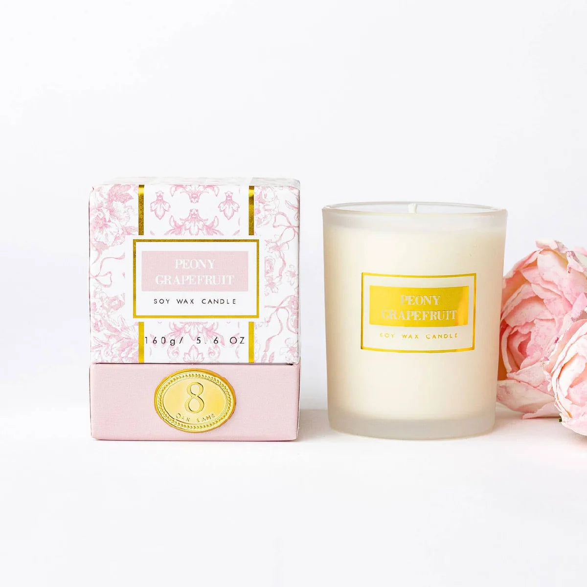 Boxed soy wax candle with glass jar and gold label, Peony Grapefruit scent