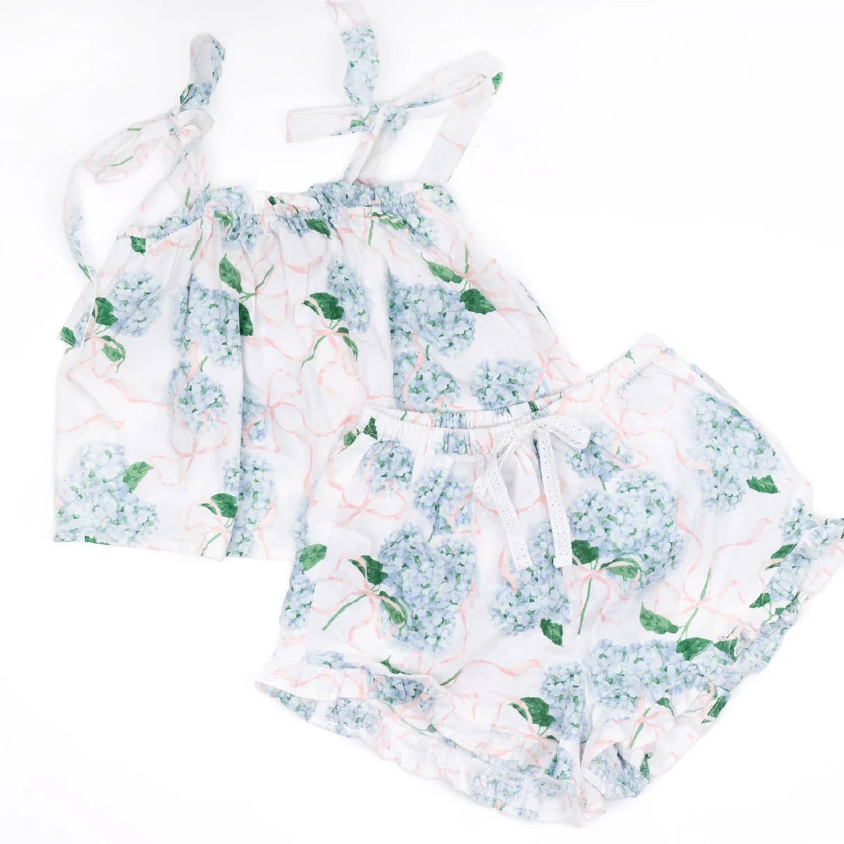 Hydrangea print ruffle sleep set flat lay: tie-back camisole top and shorts with waist tie