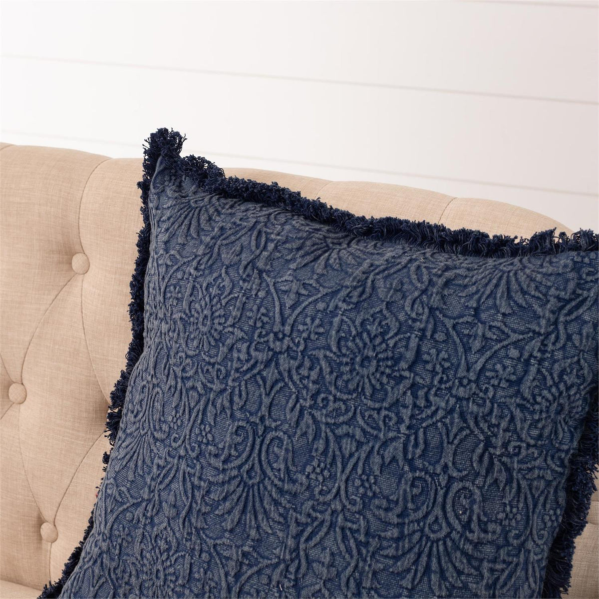Indigo matelassé medallion throw pillow with fringe trim