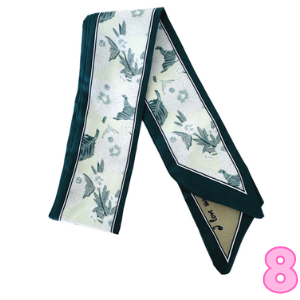 Women’s printed scarf in dark teal with pale floral print and navy trim